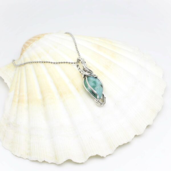 Gioiello sartoriale con Larimar e argento