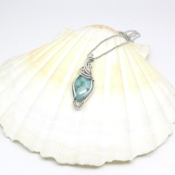 Gioiello sartoriale con Larimar e argento