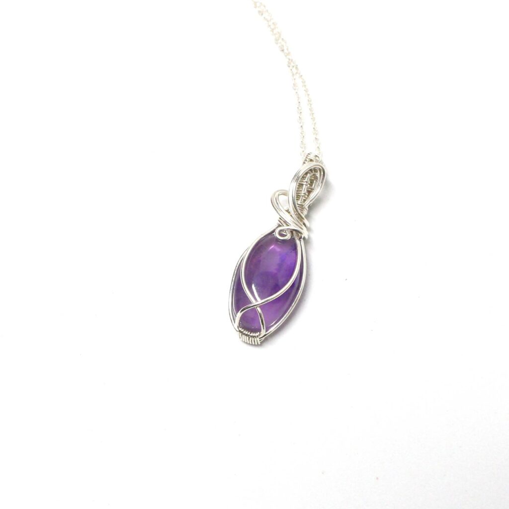 Gioiello Sartoriale con Ametista in argento