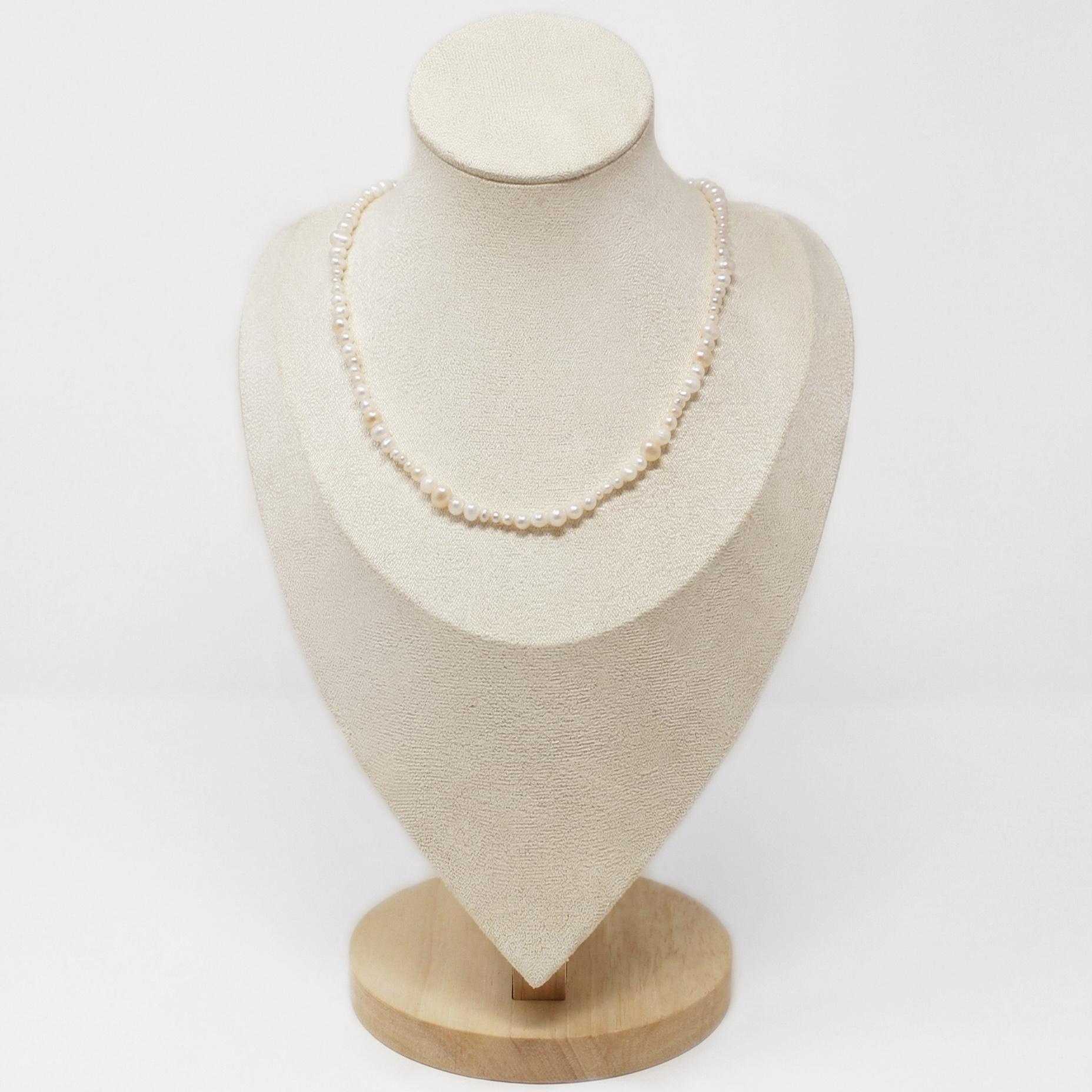 girocollo della linea Pura con perle naturali in acciaio dorato